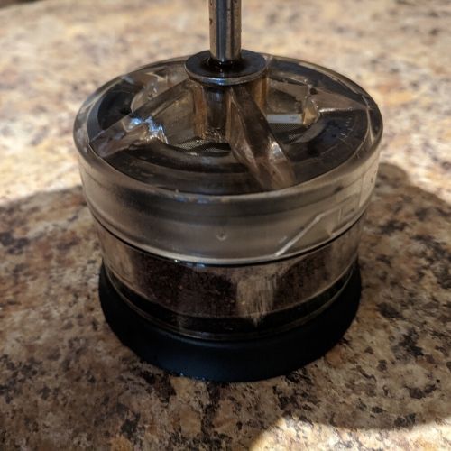 Basket attached to coffee plunger
